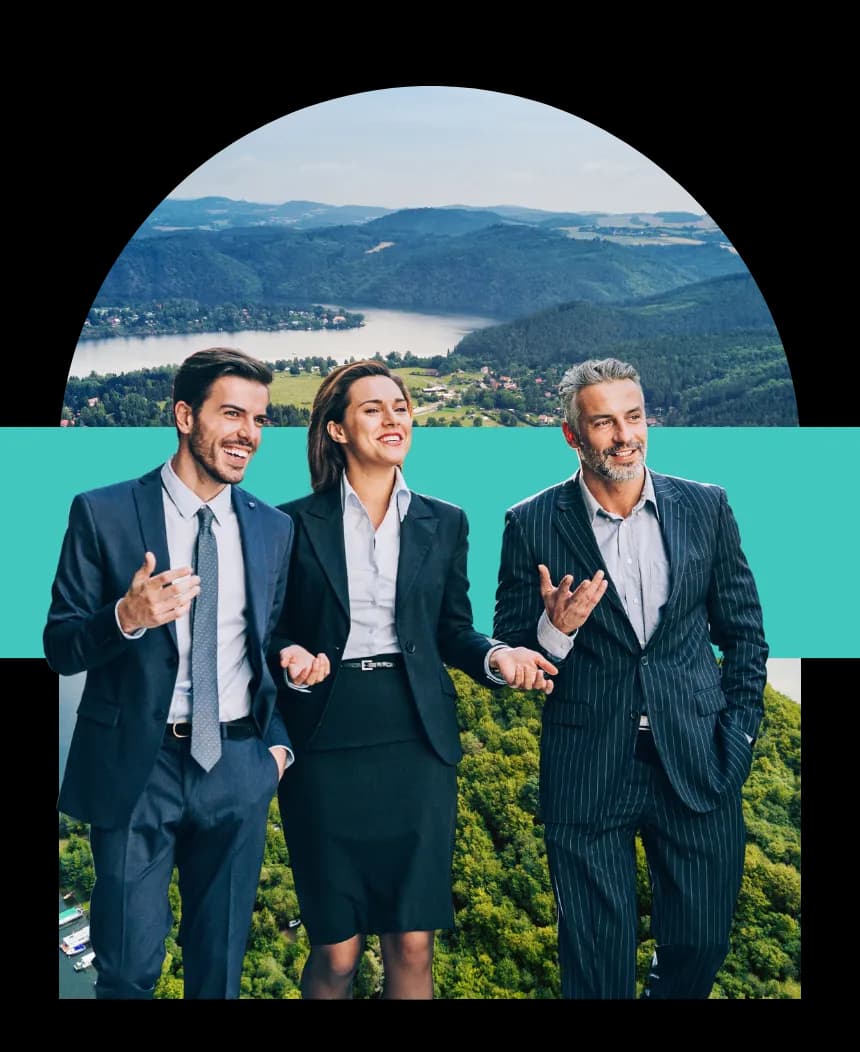 Three colleagues walking together while in discussion